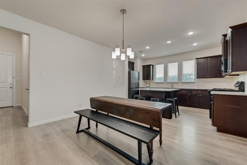 624 Hazeltine Road Red Oak, TX 75154 - Photo 12 of 37 a kitchen with sink stove and refrigerator
