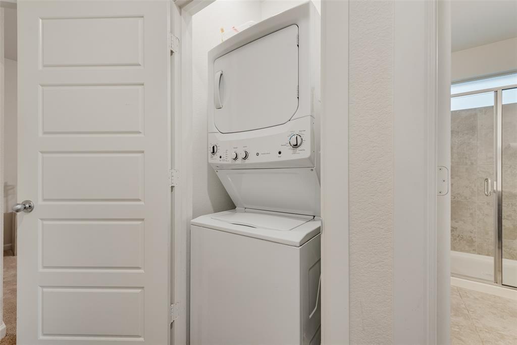624 Hazeltine Road Red Oak, TX 75154 - Photo 33 of 37 a utility room with dryer and washer