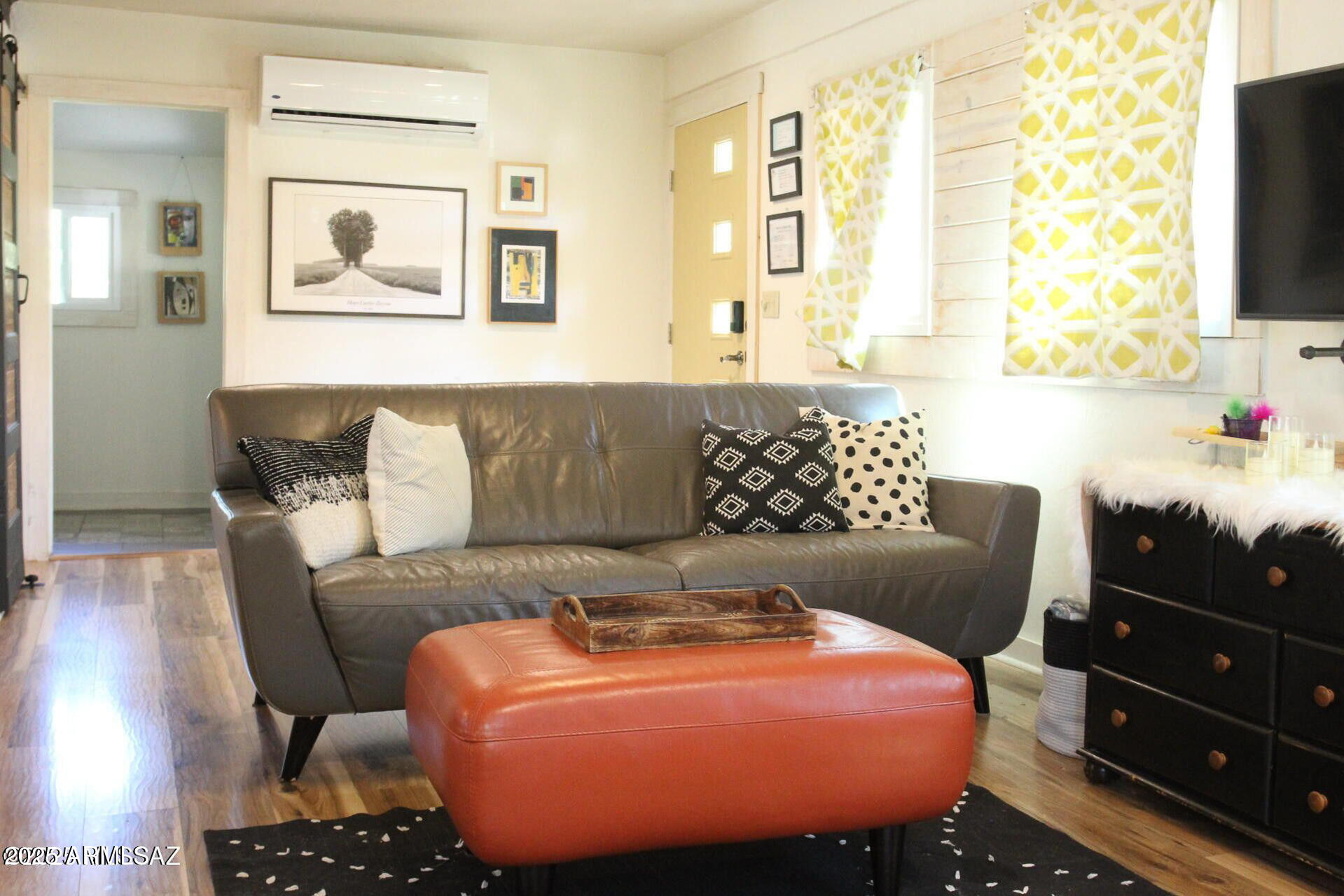 1 Arizona Street Bisbee, AZ 85603 - Photo 12 of 38 a living room with furniture and a flat screen tv