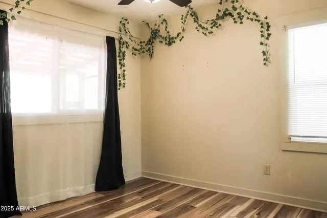 a view of a bathroom with a shower and a window
