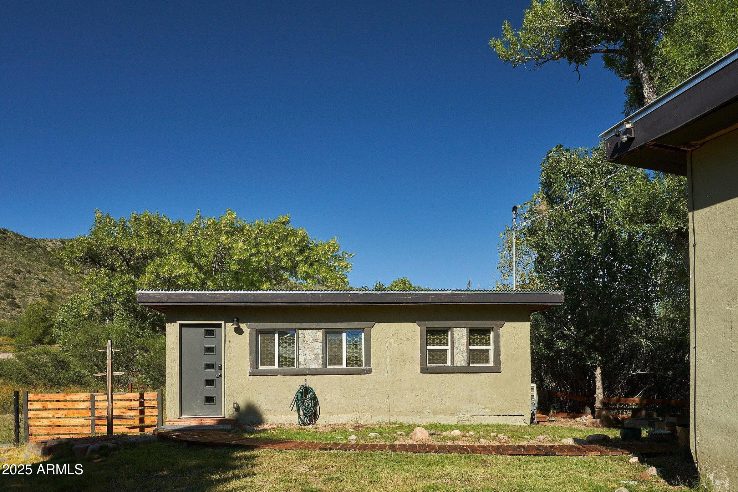 1 Arizona Street Bisbee, AZ 85603 - Photo 28 of 38 a view of a house with backyard and garden