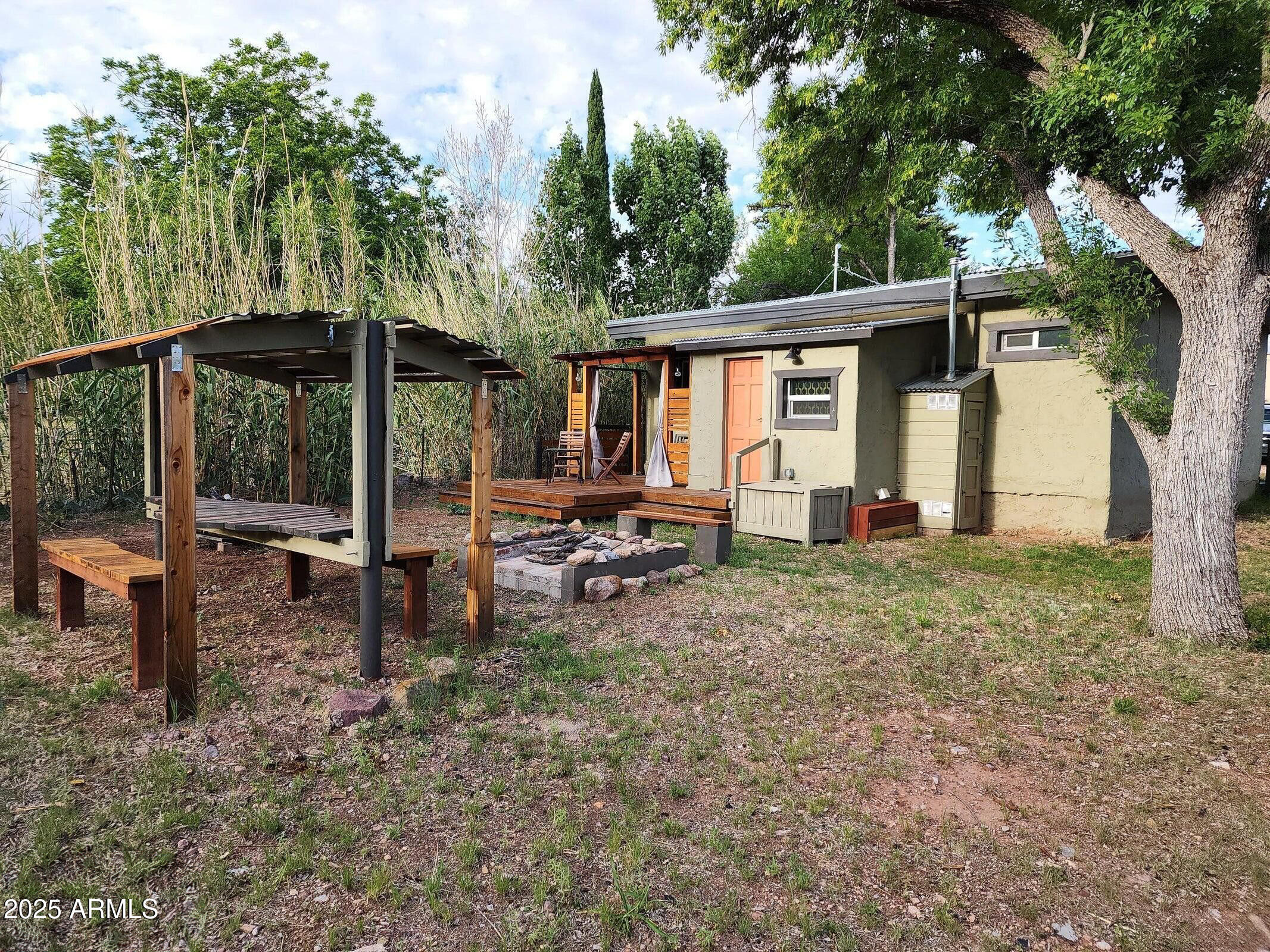 1 Arizona Street Bisbee, AZ 85603 - Photo 31 of 38 a view of a house with backyard and sitting area