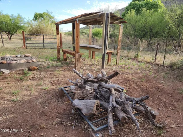 a backyard of a house with lots of green space