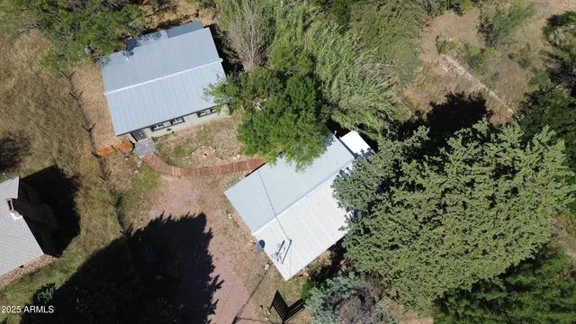an aerial view of residential house with outdoor space