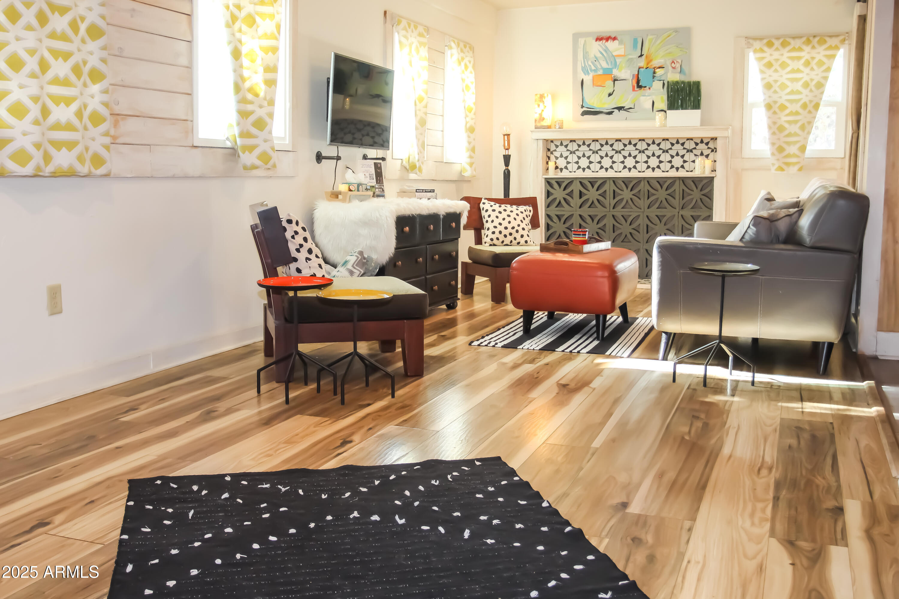 1 Arizona Street Bisbee, AZ 85603 - Photo 5 of 38 a living room with furniture and a fireplace