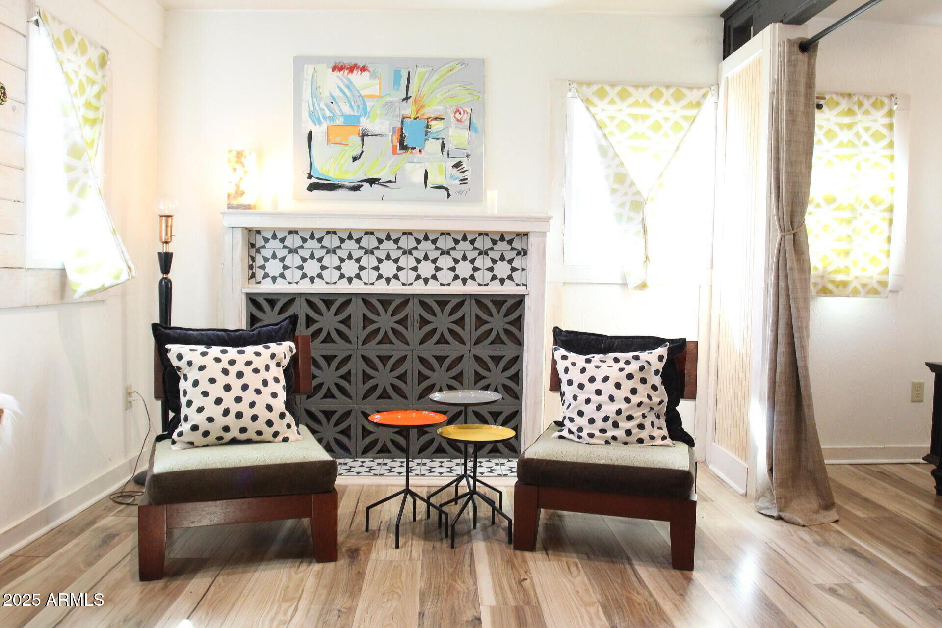 1 Arizona Street Bisbee, AZ 85603 - Photo 6 of 38 a living room with furniture and a fireplace