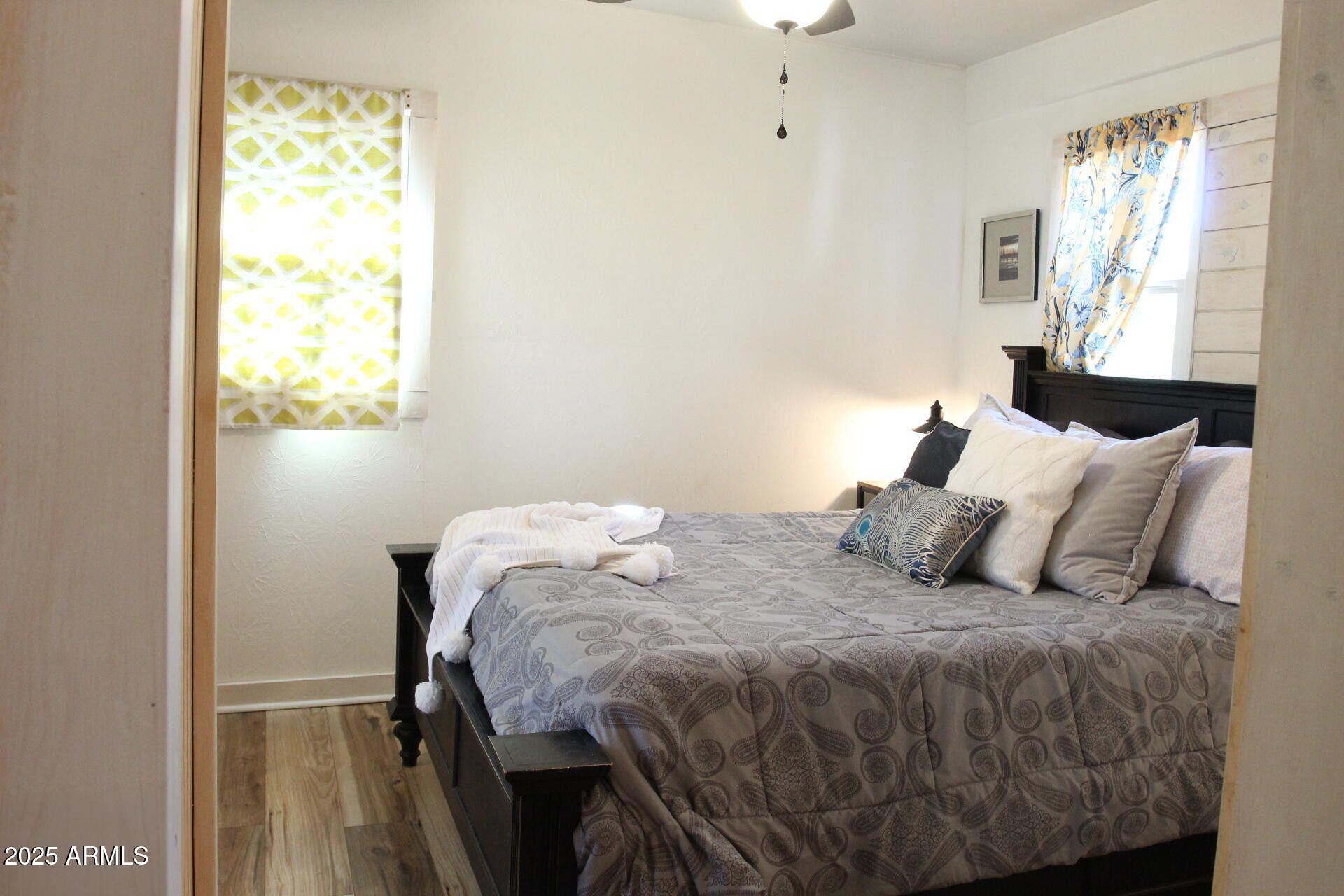 1 Arizona Street Bisbee, AZ 85603 - Photo 8 of 38 a bedroom with a bed and a window