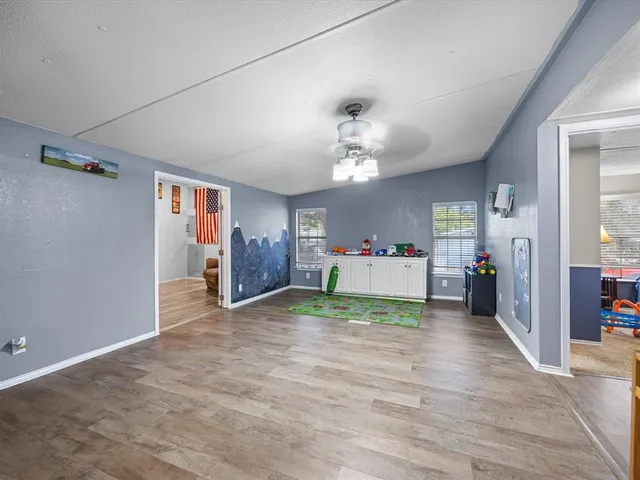 a view of livingroom with furniture and a chandelier