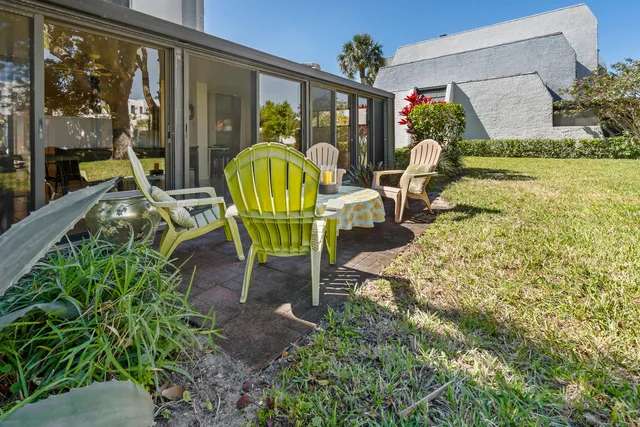 a couple of table and chairs in the patio