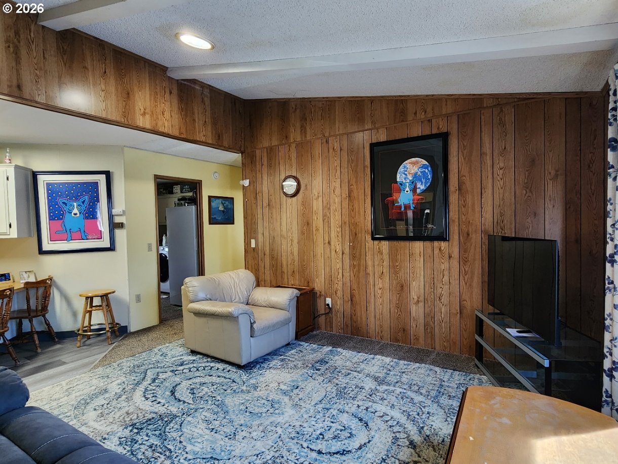 430 Birch Street Drain, OR 97435 - Photo 14 of 33 a living room with furniture and a flat screen tv