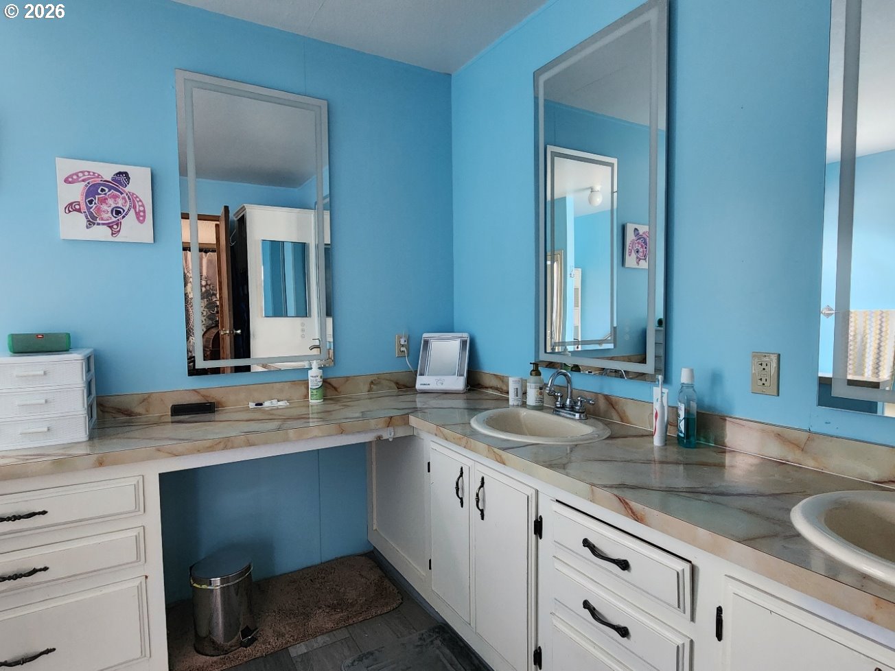 430 Birch Street Drain, OR 97435 - Photo 18 of 33 a bathroom with a granite countertop sink and a mirror