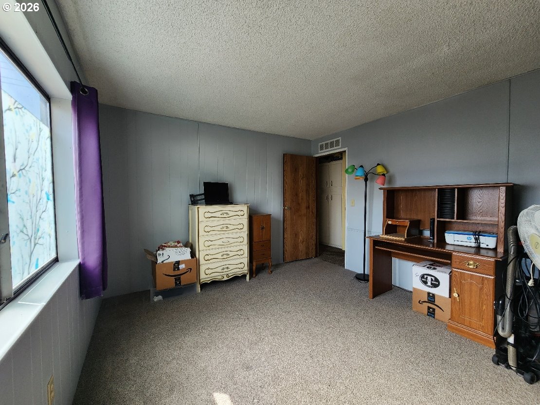 430 Birch Street Drain, OR 97435 - Photo 21 of 33 a view of a livingroom with storage and utility