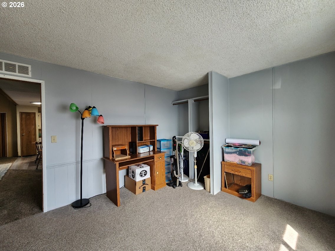 430 Birch Street Drain, OR 97435 - Photo 22 of 33 a view of room with furniture and a ceiling fan