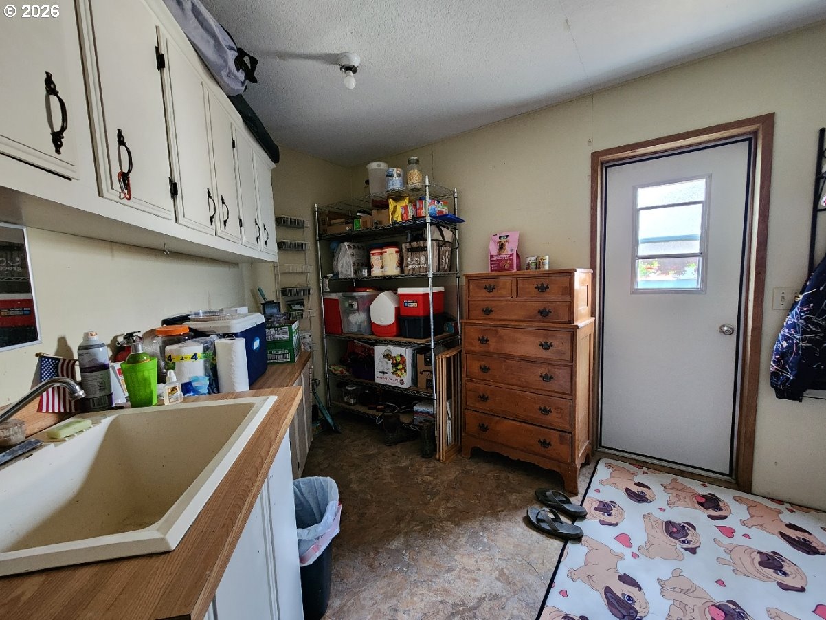430 Birch Street Drain, OR 97435 - Photo 26 of 33 a room with storage and utility