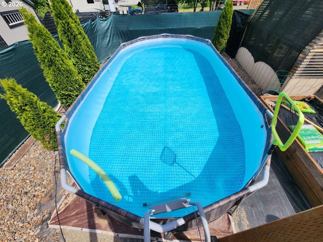430 Birch Street Drain, OR 97435 - Photo 29 of 33 a view of a swimming pool with a patio