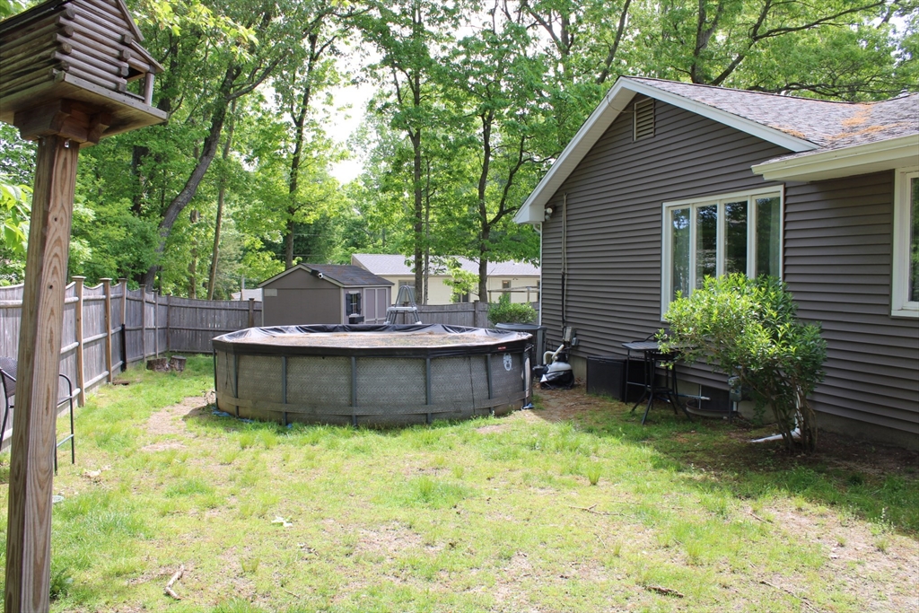 225 Braemoor Road Brockton, MA 02301 - Photo 3 of 29 a view of a backyard with a tub