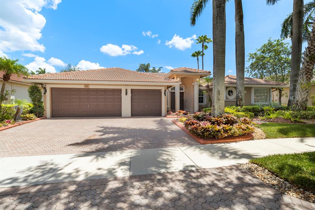 3707 Oak Ridge Circle Weston, FL 33331 - Photo 1 of 47 a view of a house with a yard