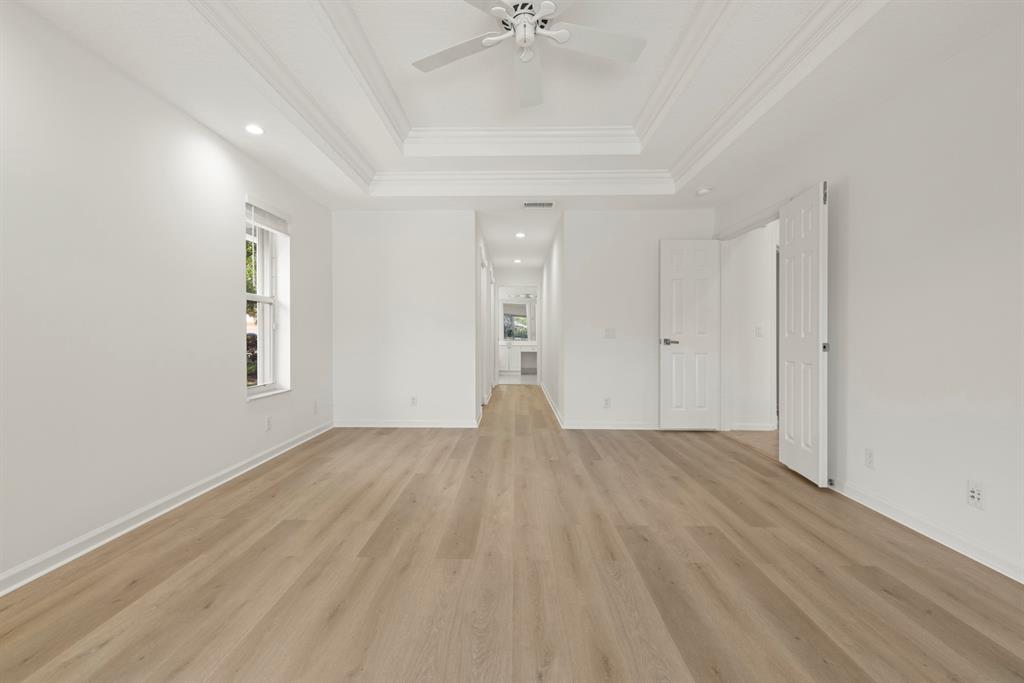 3707 Oak Ridge Circle Weston, FL 33331 - Photo 16 of 47 an empty room with fan and windows