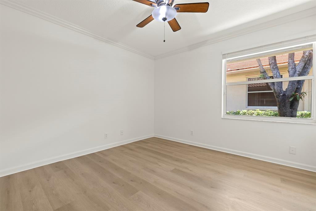 3707 Oak Ridge Circle Weston, FL 33331 - Photo 21 of 47 a view of an empty room with a window