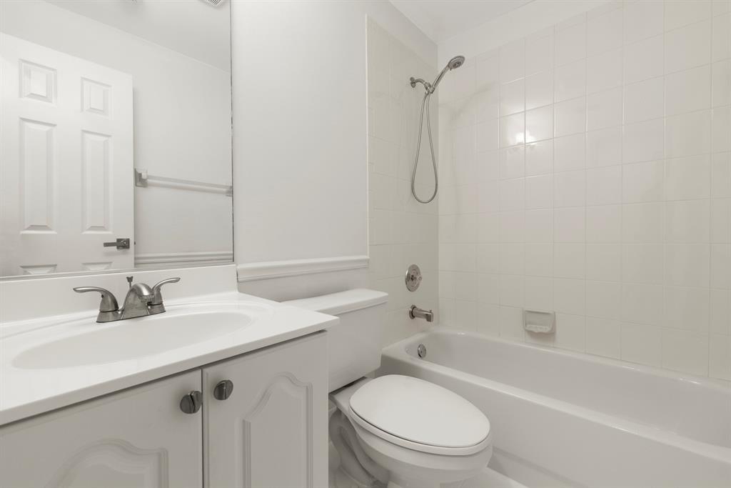 3707 Oak Ridge Circle Weston, FL 33331 - Photo 22 of 47 a bathroom with a sink a toilet and a bathtub