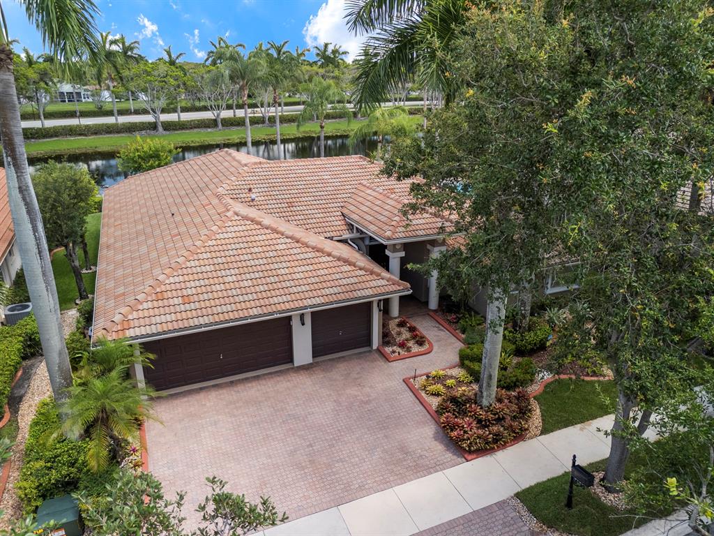 3707 Oak Ridge Circle Weston, FL 33331 - Photo 33 of 47 a view of a house with a yard