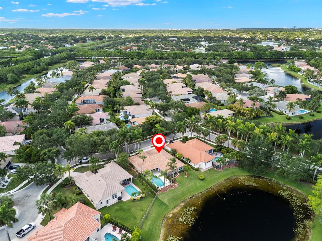 3707 Oak Ridge Circle Weston, FL 33331 - Photo 38 of 47 an aerial view of residential houses with outdoor space and trees