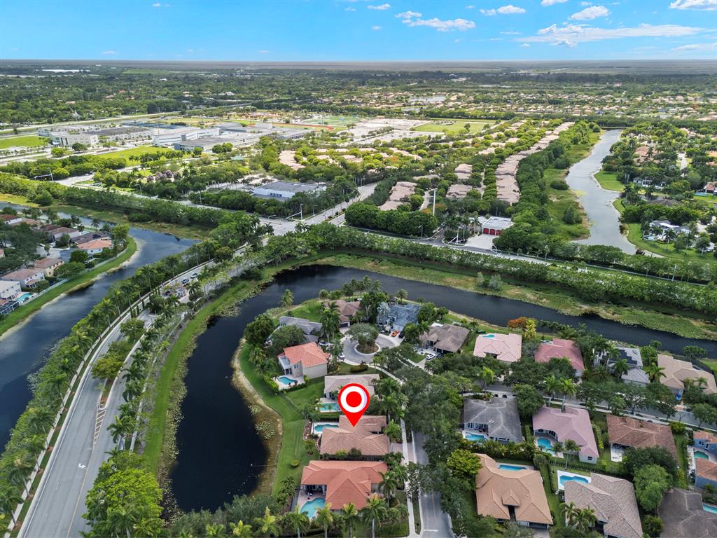 3707 Oak Ridge Circle Weston, FL 33331 - Photo 40 of 47 an aerial view of residential houses with outdoor space and lake view