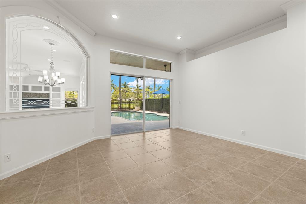 3707 Oak Ridge Circle Weston, FL 33331 - Photo 4 of 47 a view of an empty room with a window