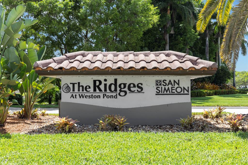 3707 Oak Ridge Circle Weston, FL 33331 - Photo 43 of 47 a sign on the side of the road