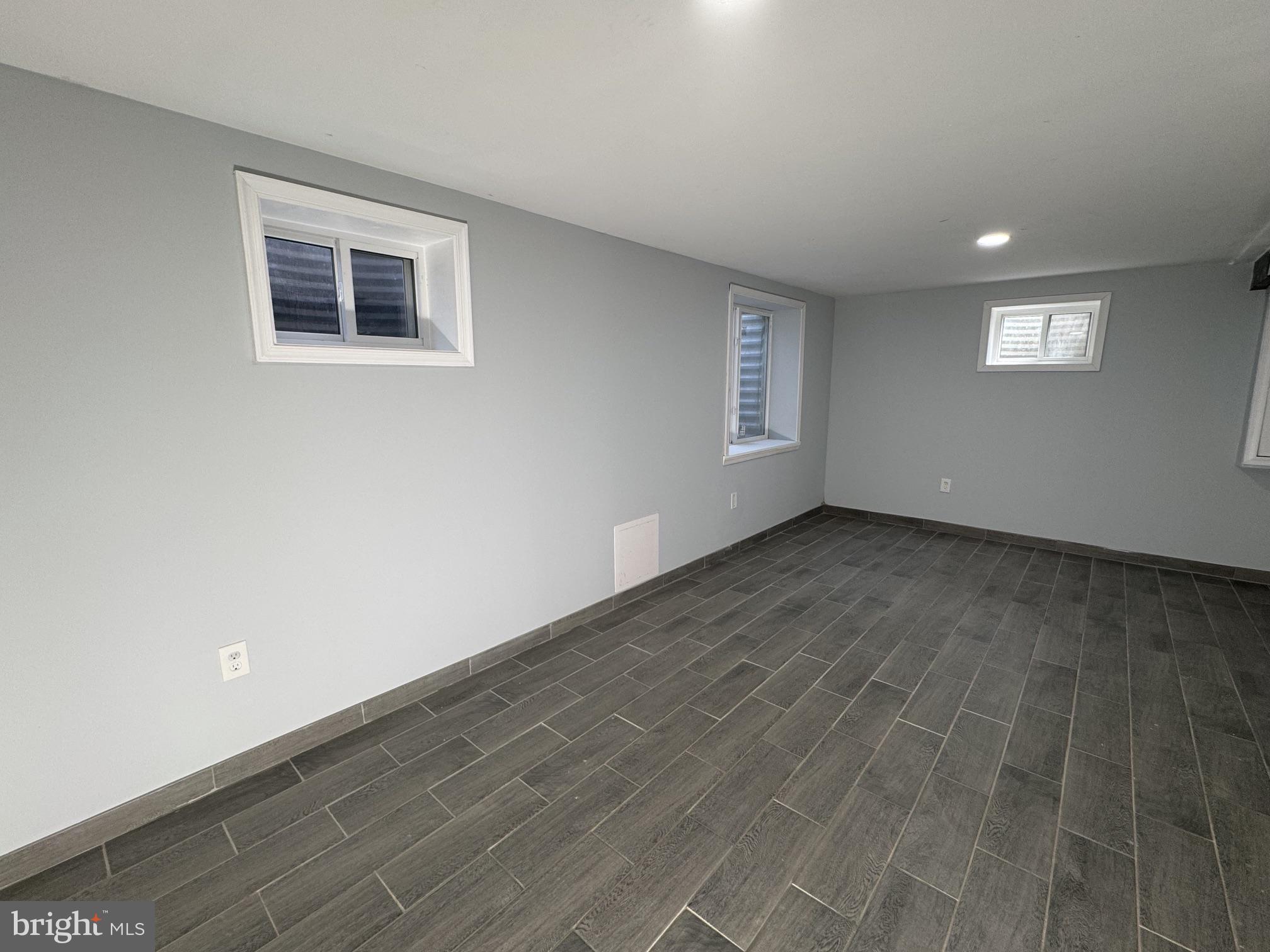 6603 Huntsman Boulevard Springfield, VA 22152 - Photo 38 of 64 Bright, open space with modern tiles.