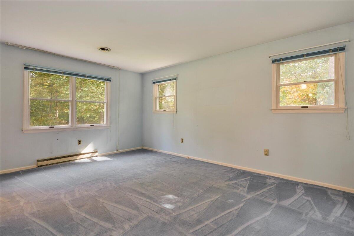 179 Hunting Ridge Road Stamford, CT 06903 - Photo 13 of 24 a view of an empty room with a window
