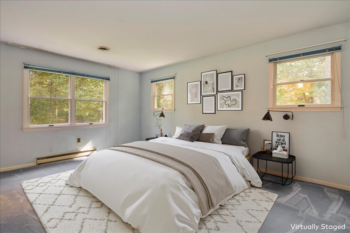 179 Hunting Ridge Road Stamford, CT 06903 - Photo 14 of 24 a bedroom with a bed and a window