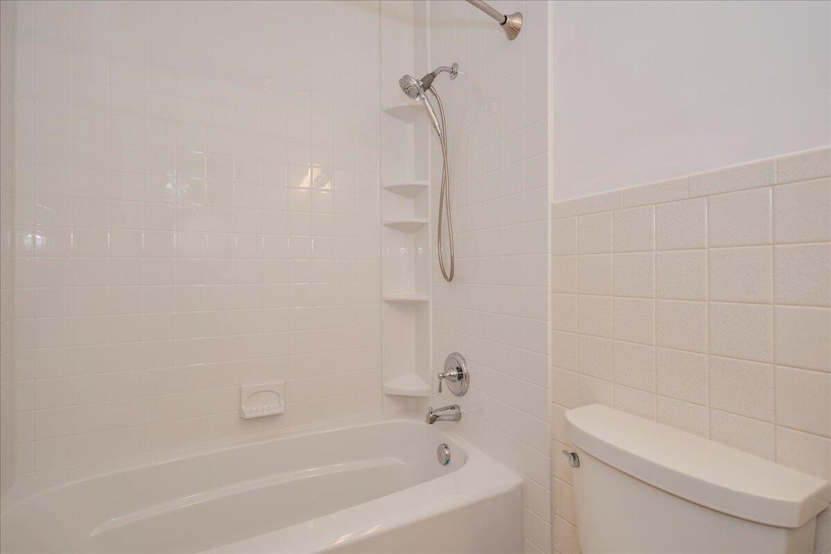 179 Hunting Ridge Road Stamford, CT 06903 - Photo 16 of 24 a bathroom with a bathtub and a toilet