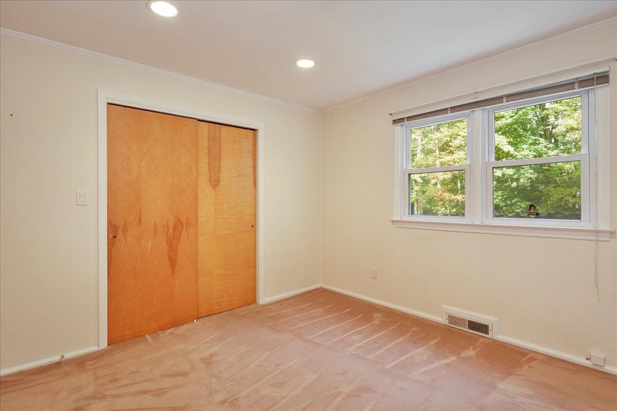 179 Hunting Ridge Road Stamford, CT 06903 - Photo 18 of 24 a view of empty room with window