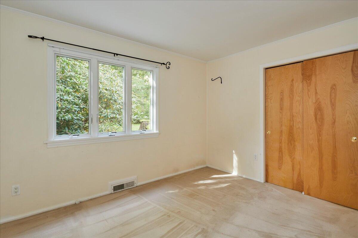 179 Hunting Ridge Road Stamford, CT 06903 - Photo 20 of 24 a view of an empty room with a window