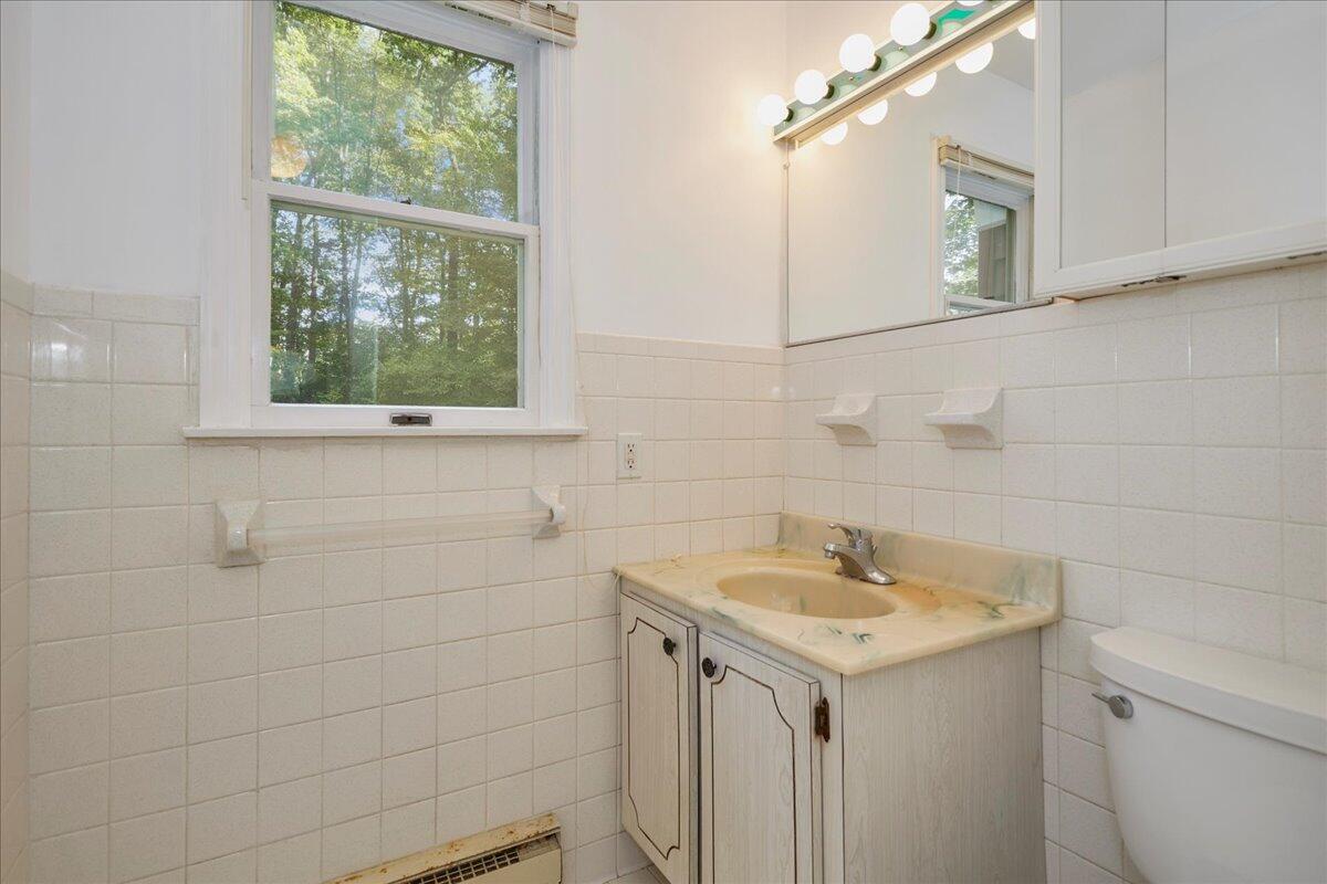 179 Hunting Ridge Road Stamford, CT 06903 - Photo 21 of 24 a bathroom with a sink and vanity