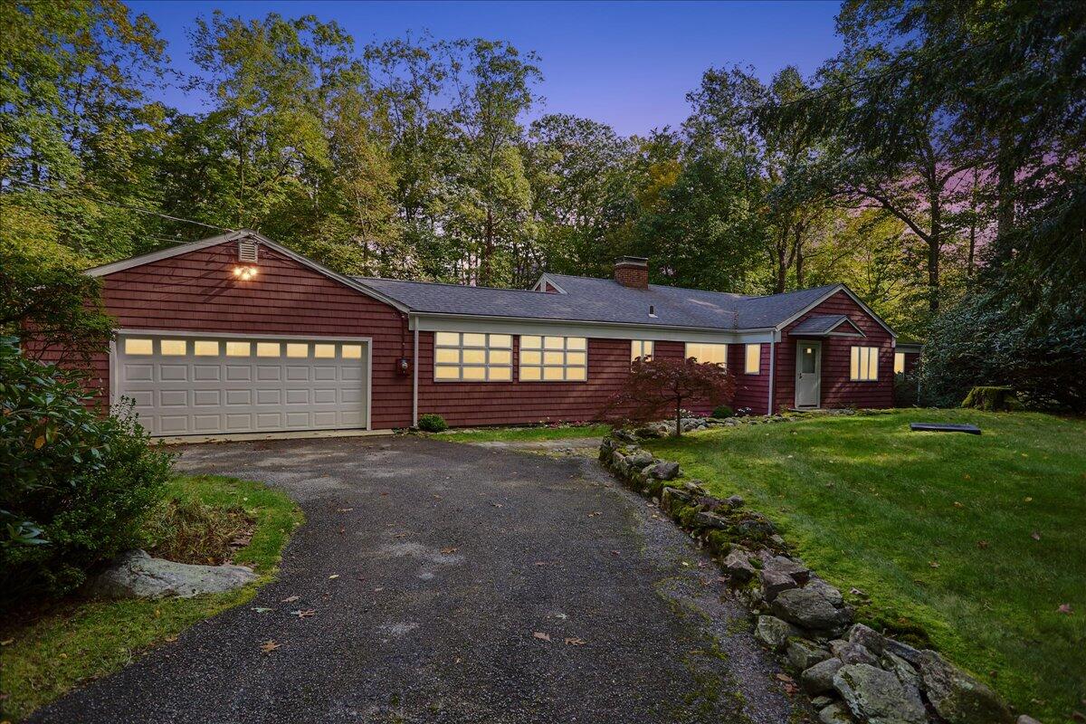 179 Hunting Ridge Road Stamford, CT 06903 - Photo 23 of 24 a sign board with a house in the background