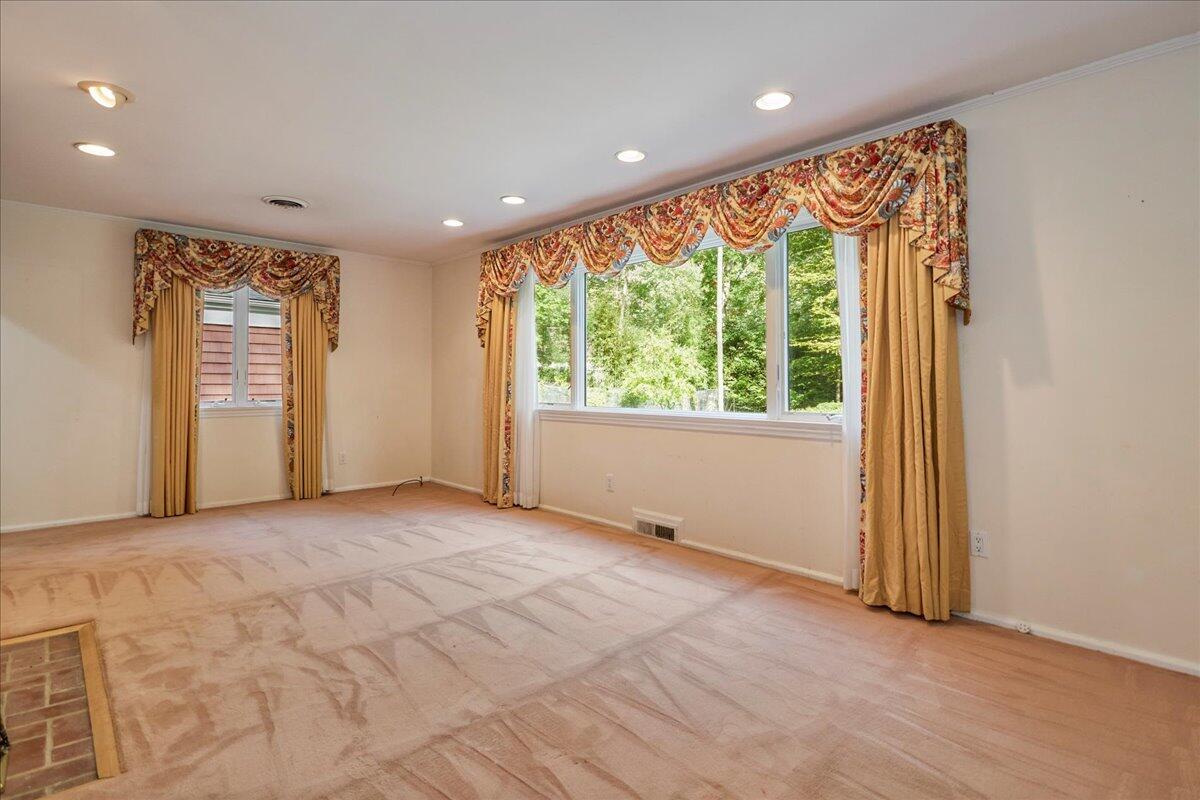 179 Hunting Ridge Road Stamford, CT 06903 - Photo 8 of 24 a view of an empty room with a window