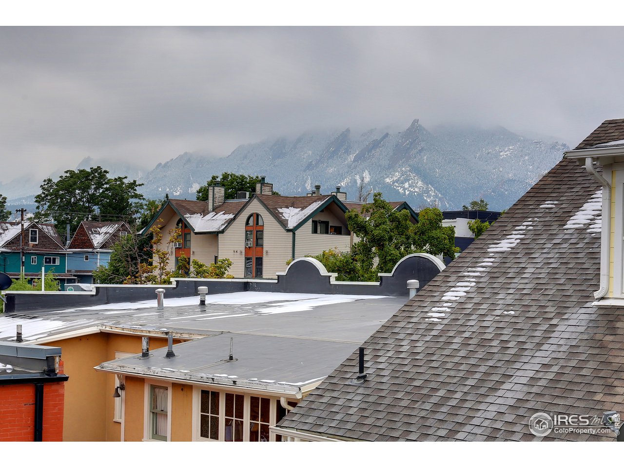 1933 Pearl Street, Unit 7 Boulder, CO 80302 - Photo 14 of 21 a picture of houses with outdoor space and seating area