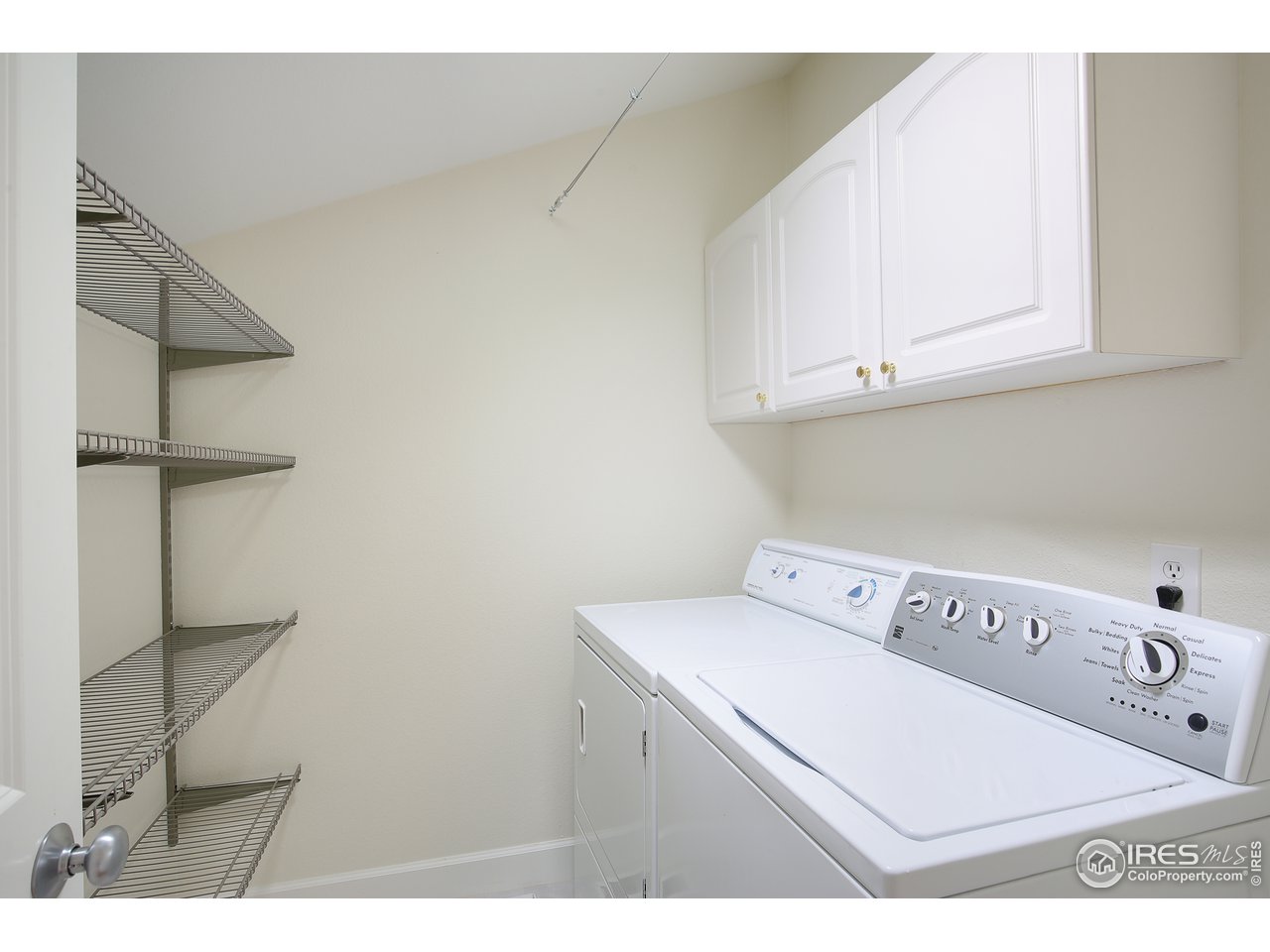 1933 Pearl Street, Unit 7 Boulder, CO 80302 - Photo 15 of 21 a utility room with dryer and washer