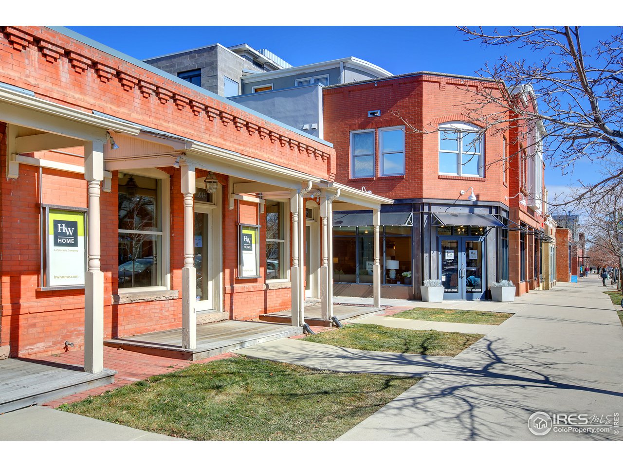 1933 Pearl Street, Unit 7 Boulder, CO 80302 - Photo 17 of 21 a view of a building with a yard