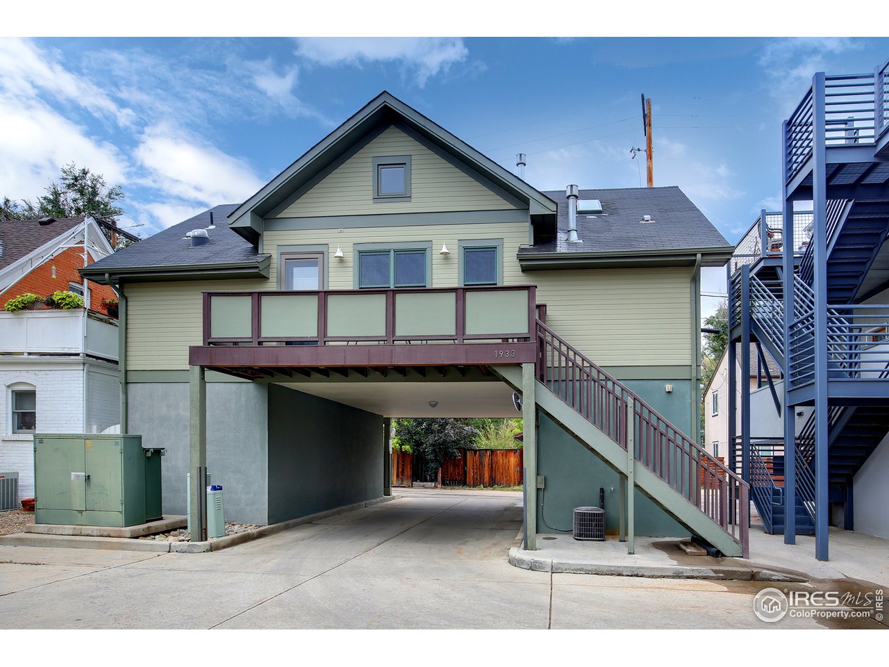 1933 Pearl Street, Unit 7 Boulder, CO 80302 - Photo 20 of 21 a view of a house with a garage