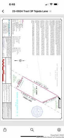 a black and white photo of a living room