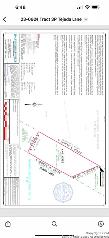 a black and white photo of a living room