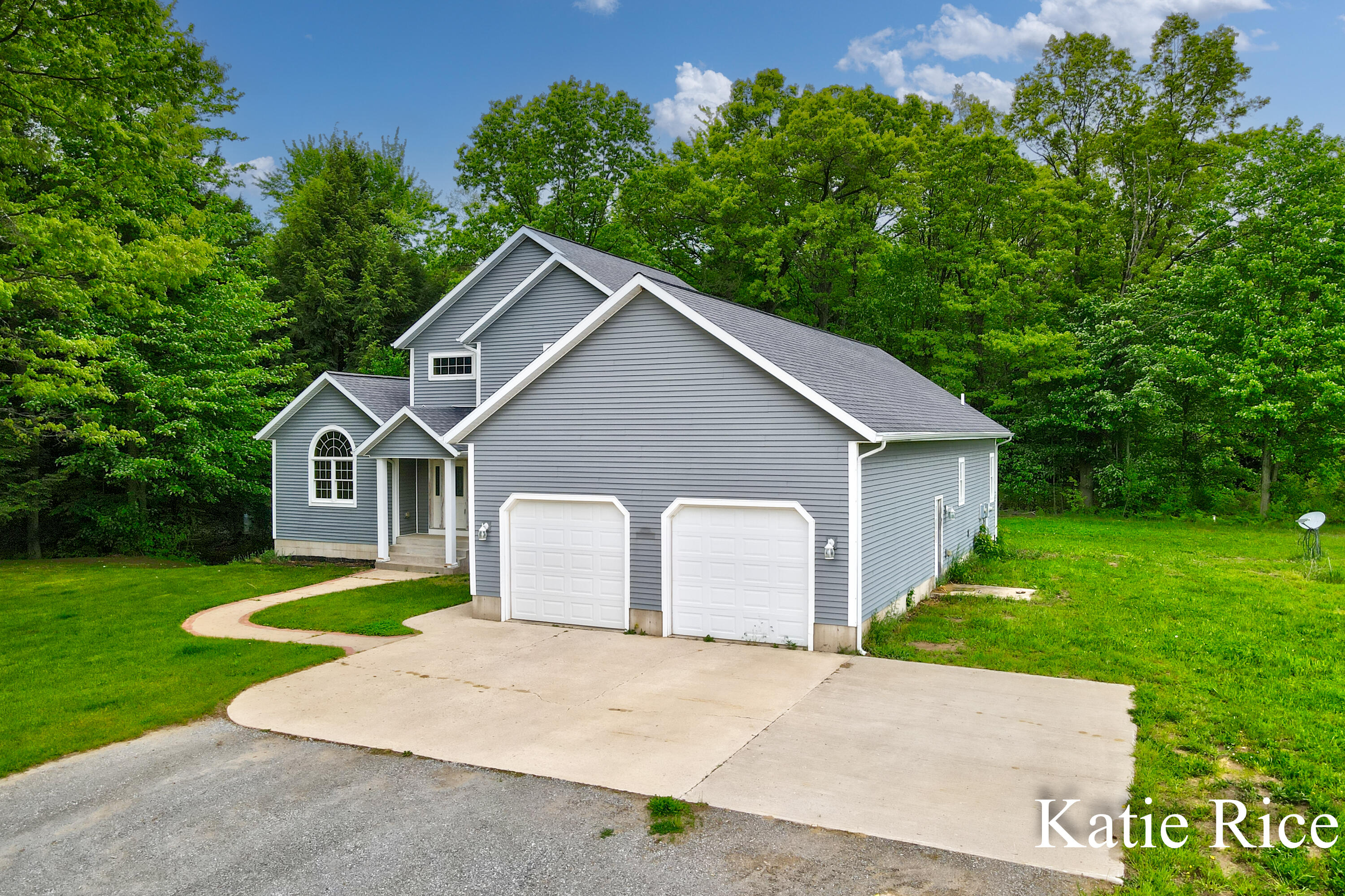 4142 West Skeels Road Montague, MI 49437 - Photo 4 of 69 Katie Rice 4142 Skeels Road Exteriors-2