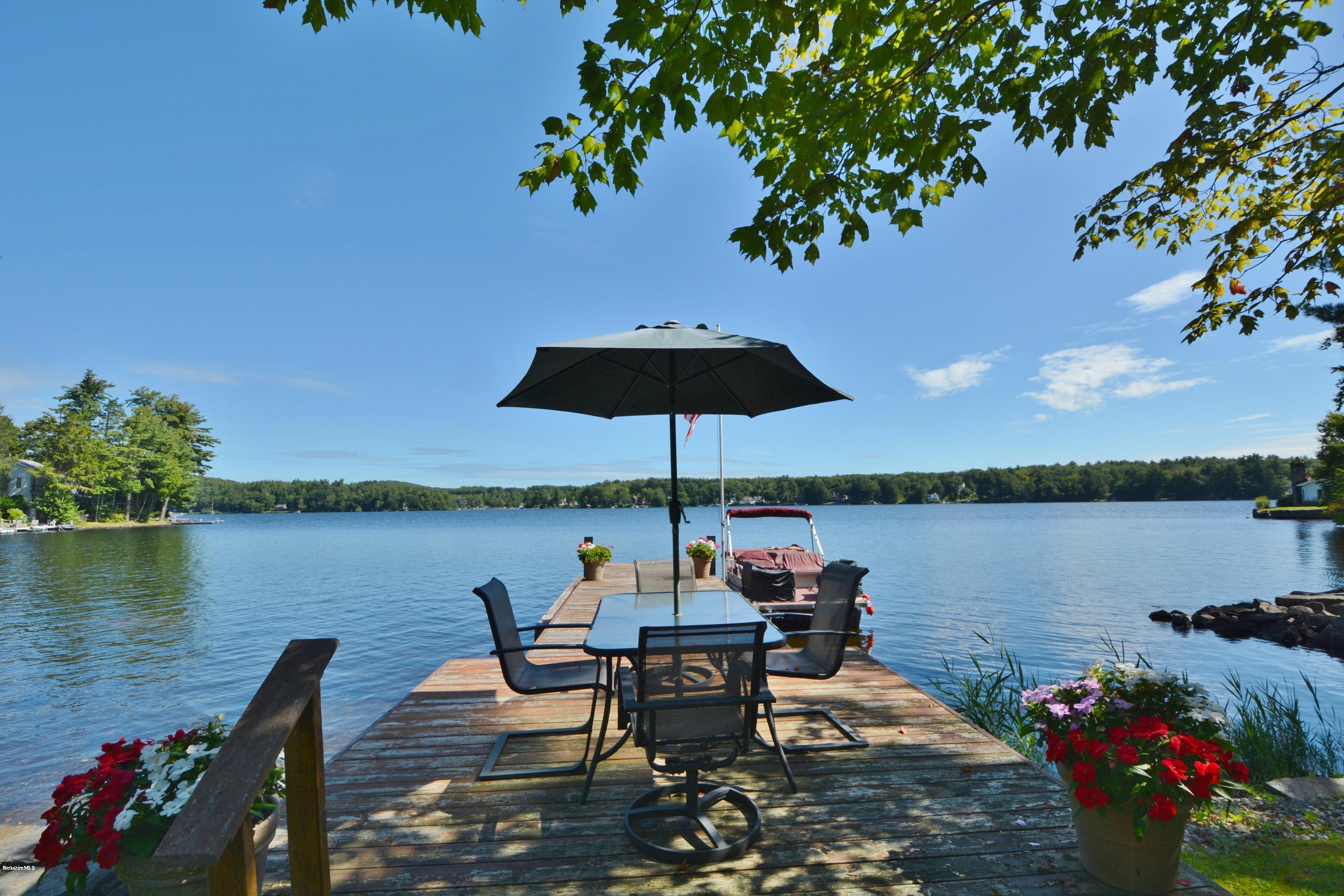 18 Moody Goodman Road Otis, MA 01029 - Photo 1 of 29 a lake view with a sitting space and a lake view