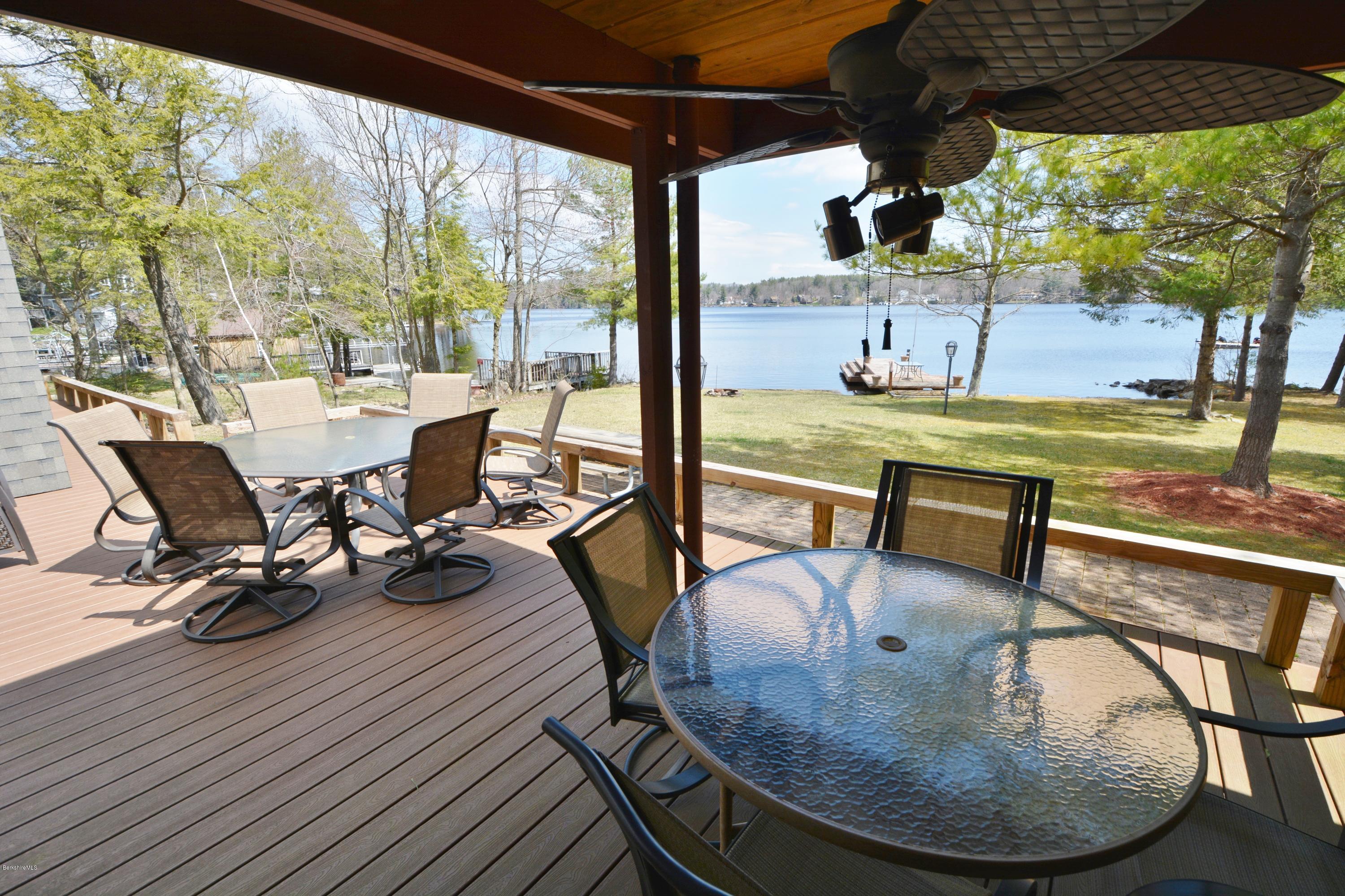 18 Moody Goodman Road Otis, MA 01029 - Photo 5 of 29 a view of a swimming pool with a lounge chairs