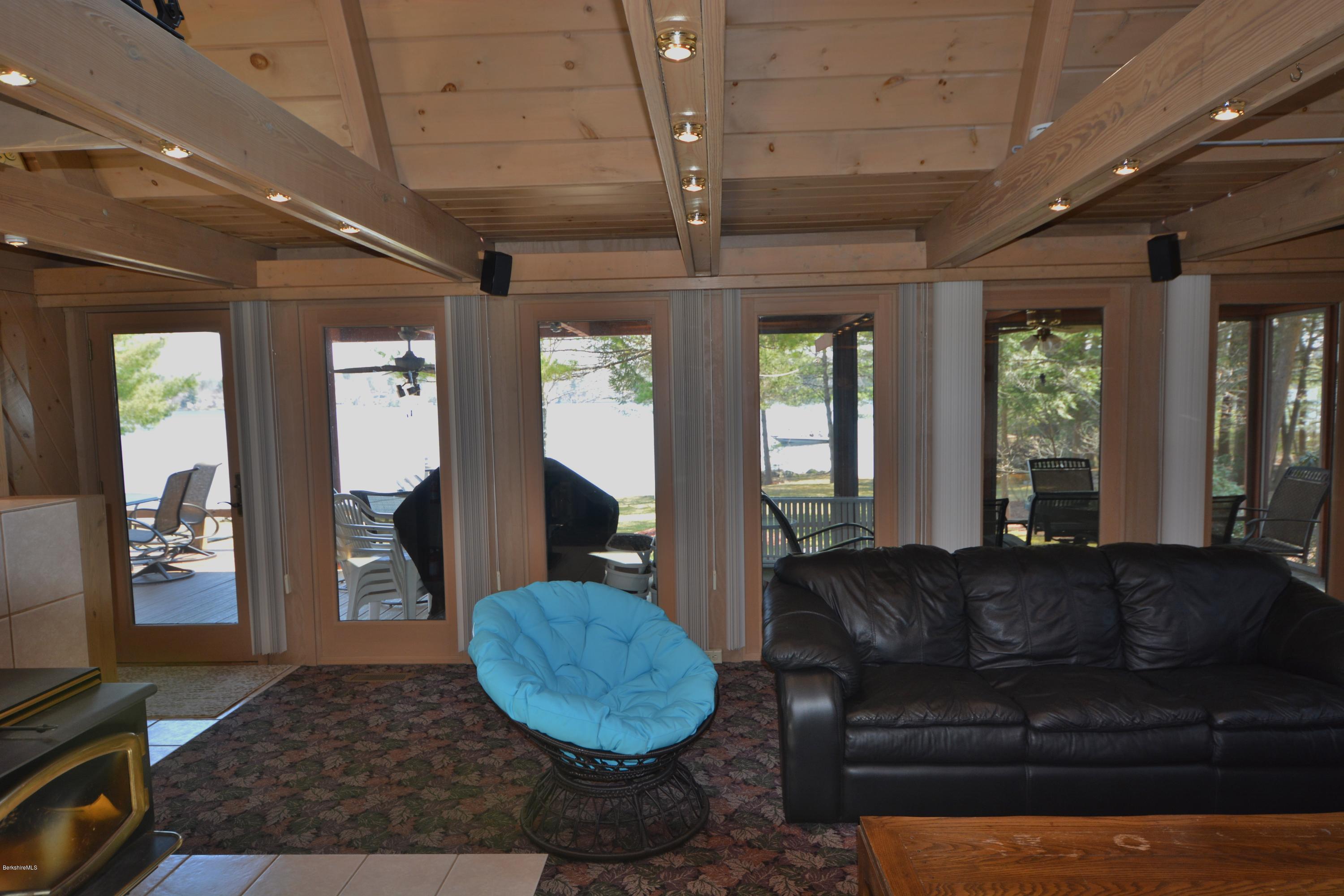 18 Moody Goodman Road Otis, MA 01029 - Photo 10 of 29 a living room with furniture and a large window
