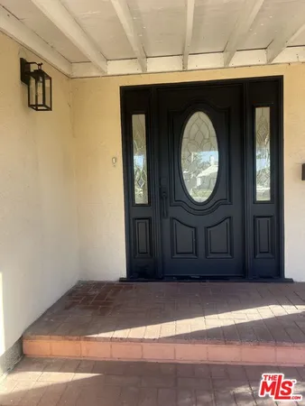 a view of a entryway door of the house