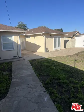 a view of car parked on the side of the road